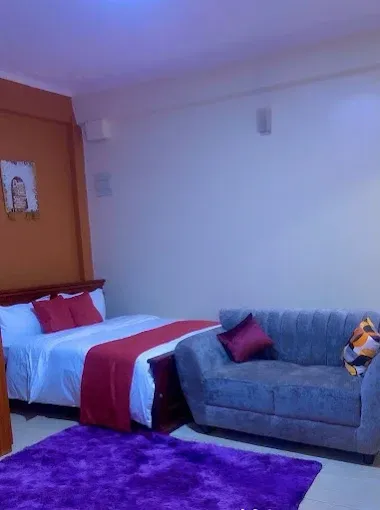 Classic maroon room with sofa